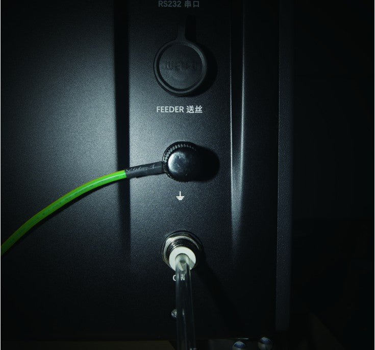 Grounding lead connected to the XMetal machine